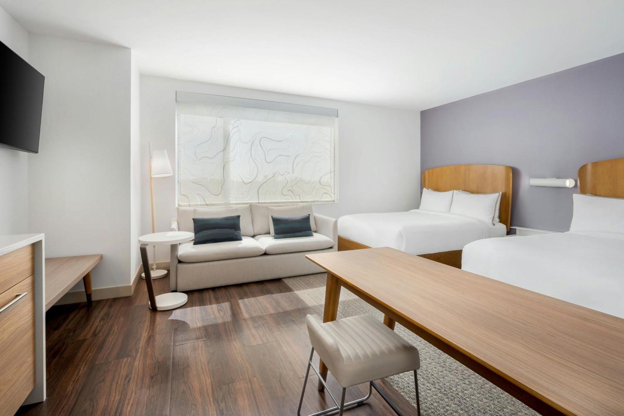 Studio with Two Queen Beds and Non-Private Sofa Bed